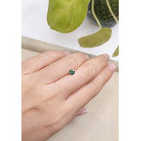 0.47 Ct. Bluish Green Sapphire from Madagascar Life Style