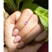 0.45 Ct. Pinkish Purple Sapphire from Ceylon (Sri Lanka) Life Style