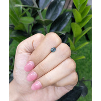 0.93 Ct. Bluish Green Sapphire from Madagascar Life Style