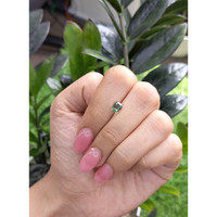 0.98 Ct. Bluish Green Sapphire from Madagascar Life Style