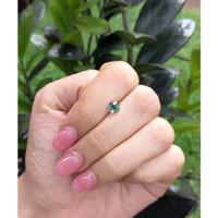 0.90 Ct. Bluish Green Sapphire from Madagascar Life Style