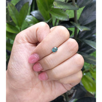 1.05 Ct. Bluish Green Sapphire from Madagascar Life Style