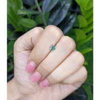 0.89 Ct. Bluish Green Sapphire from Madagascar Life Style