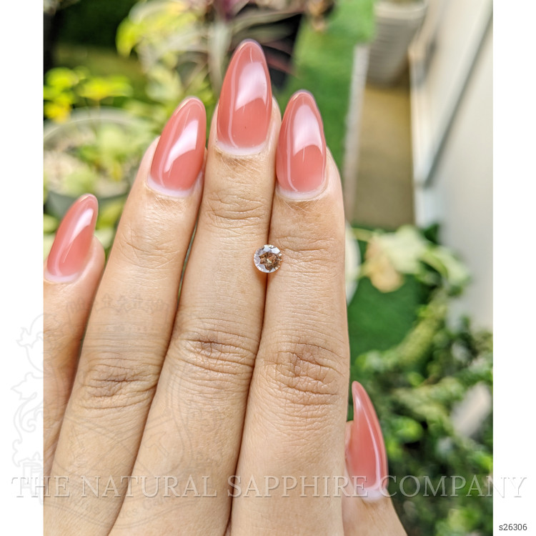 0.56 Ct. Peach Sapphire from Ceylon (Sri Lanka)