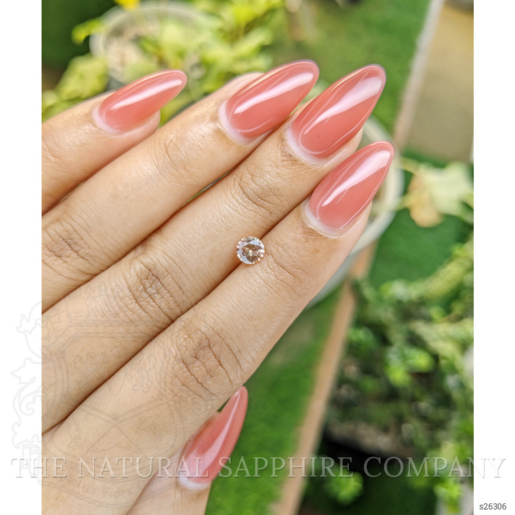 0.56 Ct. Peach Sapphire from Ceylon (Sri Lanka)