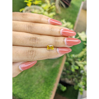 1.74 Ct. Orangish Yellow Sapphire from Ceylon (Sri Lanka) Life Style