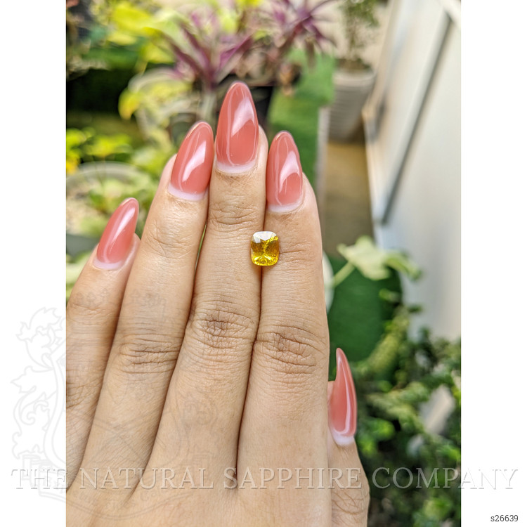 1.74 Ct. Orangish Yellow Sapphire from Ceylon (Sri Lanka)