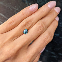 1.40 Ct. Bluish Green Sapphire from Madagascar Life Style