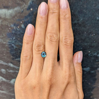 1.40 Ct. Bluish Green Sapphire from Madagascar Life Style