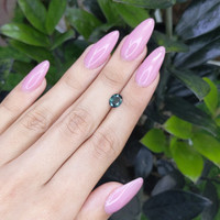 1.14 Ct. Bluish Green Sapphire from Madagascar Life Style
