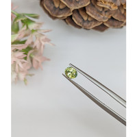 0.52 Ct. Yellowish Green Sapphire from Ceylon (Sri Lanka) Life Style