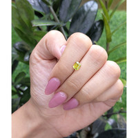 1.06 Ct. Greenish Yellow Sapphire from Madagascar Life Style