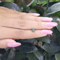 1.02 Ct. Bluish Green Sapphire from Madagascar Life Style