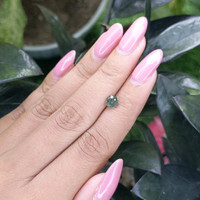 1.02 Ct. Bluish Green Sapphire from Madagascar Life Style