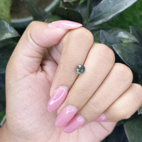 1.02 Ct. Bluish Green Sapphire from Madagascar Life Style