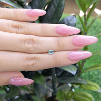 0.70 Ct. Bluish Green Sapphire from Madagascar Life Style