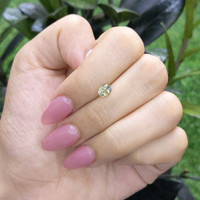 0.80 Ct. Yellowish Green Sapphire from Madagascar Life Style