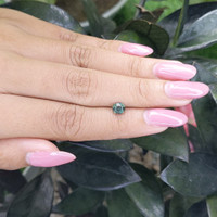 0.85 Ct. Green Sapphire from Madagascar Life Style