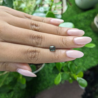 1.01 Ct. Yellowish Green Sapphire from Madagascar Life Style