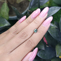 0.83 Ct. Bluish Green Sapphire from Madagascar Life Style
