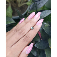 0.83 Ct. Bluish Green Sapphire from Madagascar Life Style