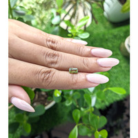 1.06 Ct. Yellowish Green Sapphire from Madagascar Life Style