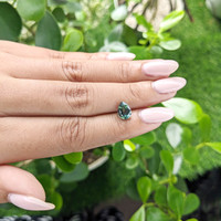 1.92 Ct. Bluish Green Sapphire from Madagascar Life Style