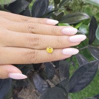 1.61 Ct. Yellow Sapphire from Madagascar Life Style