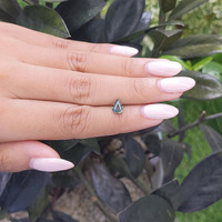 1.04 Ct. Bluish Green Sapphire from Madagascar Life Style