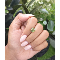 2.60 Ct. Yellowish Green Sapphire from Madagascar Life Style