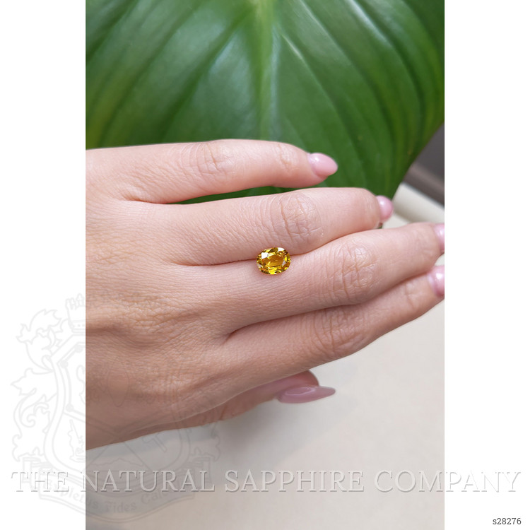 1.57 Ct. Orangish Yellow Sapphire from Ceylon (Sri Lanka)