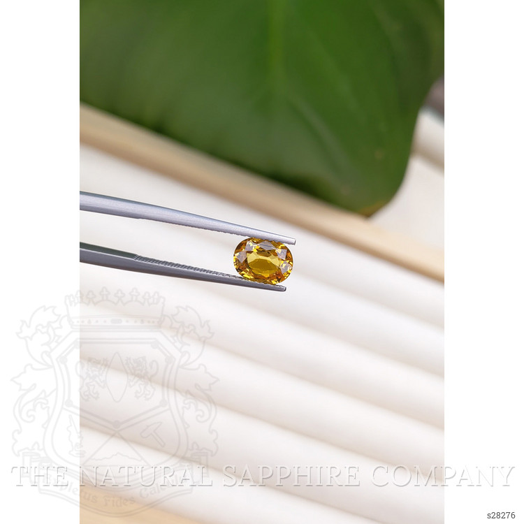 1.57 Ct. Orangish Yellow Sapphire from Ceylon (Sri Lanka)
