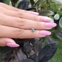 1.02 Ct. Bluish Green Sapphire from Madagascar Life Style