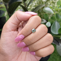 1.02 Ct. Bluish Green Sapphire from Madagascar Life Style