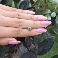 1.56 Ct. Yellowish Green Sapphire from Madagascar Life Style