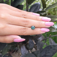 2.49 Ct. Bluish Green Sapphire from Madagascar Life Style