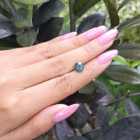 2.49 Ct. Bluish Green Sapphire from Madagascar Life Style