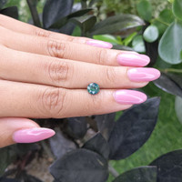 1.04 Ct. Bluish Green Sapphire from Madagascar Life Style