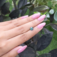 1.04 Ct. Bluish Green Sapphire from Madagascar Life Style