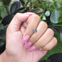 1.04 Ct. Bluish Green Sapphire from Madagascar Life Style