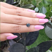 1.51 Ct. Greenish Blue Sapphire from Madagascar Life Style