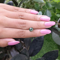 2.09 Ct. Bluish Green Sapphire from Madagascar Life Style