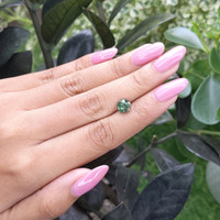 2.09 Ct. Bluish Green Sapphire from Madagascar Life Style