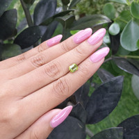 2.06 Ct. Yellowish Green Sapphire from Madagascar Life Style