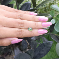 2.05 Ct. Yellowish Green Sapphire from Madagascar Life Style