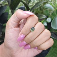 2.05 Ct. Yellowish Green Sapphire from Madagascar Life Style