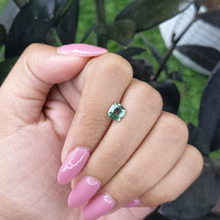 1.03 Ct. Bluish Green Sapphire from Madagascar Life Style