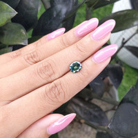 1.65 Ct. Bluish Green Sapphire from Madagascar Life Style