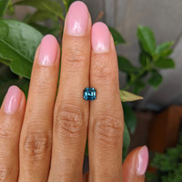 1.61 Ct. Bluish Green Sapphire from Madagascar Life Style