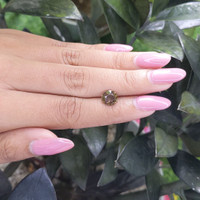 2.11 Ct. Greenish Brown Sapphire from Madagascar Life Style